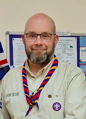 Michael Holroyd in Scout uniform preparing for the London Marathon